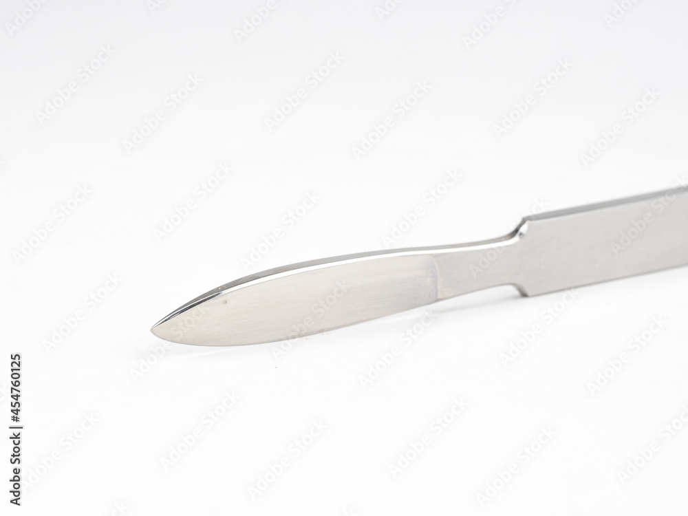 the steel medical scalpel on a white background the steel medical scalpel on a white background