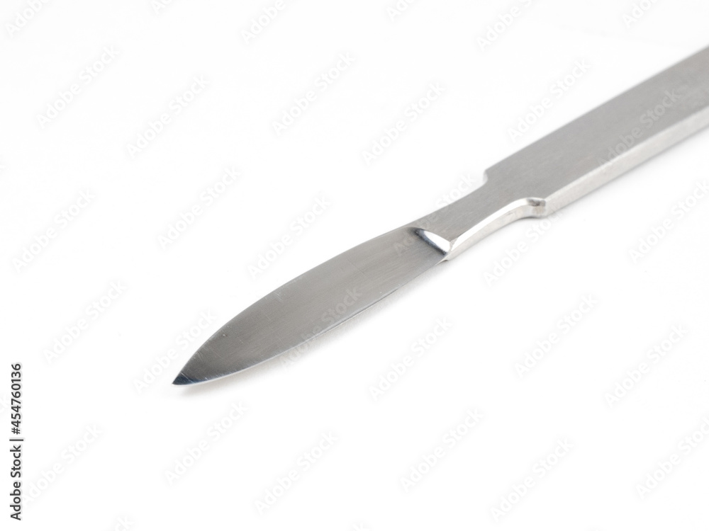 the steel medical scalpel on a white background the steel medical scalpel on a white background