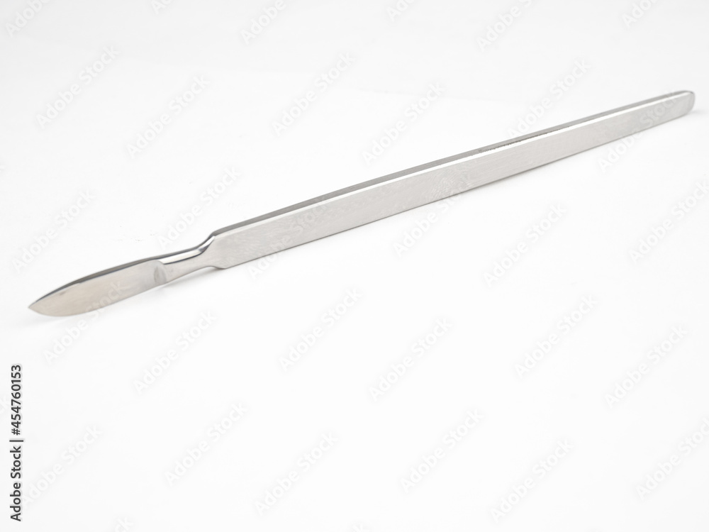 the steel medical scalpel on a white background the steel medical scalpel on a white background