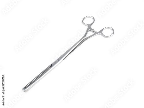 steel surgical clamp on white background