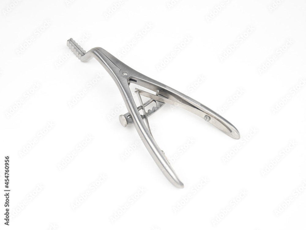 steel surgical clamp with retainer on a white background steel surgical clamp with retainer on a white background