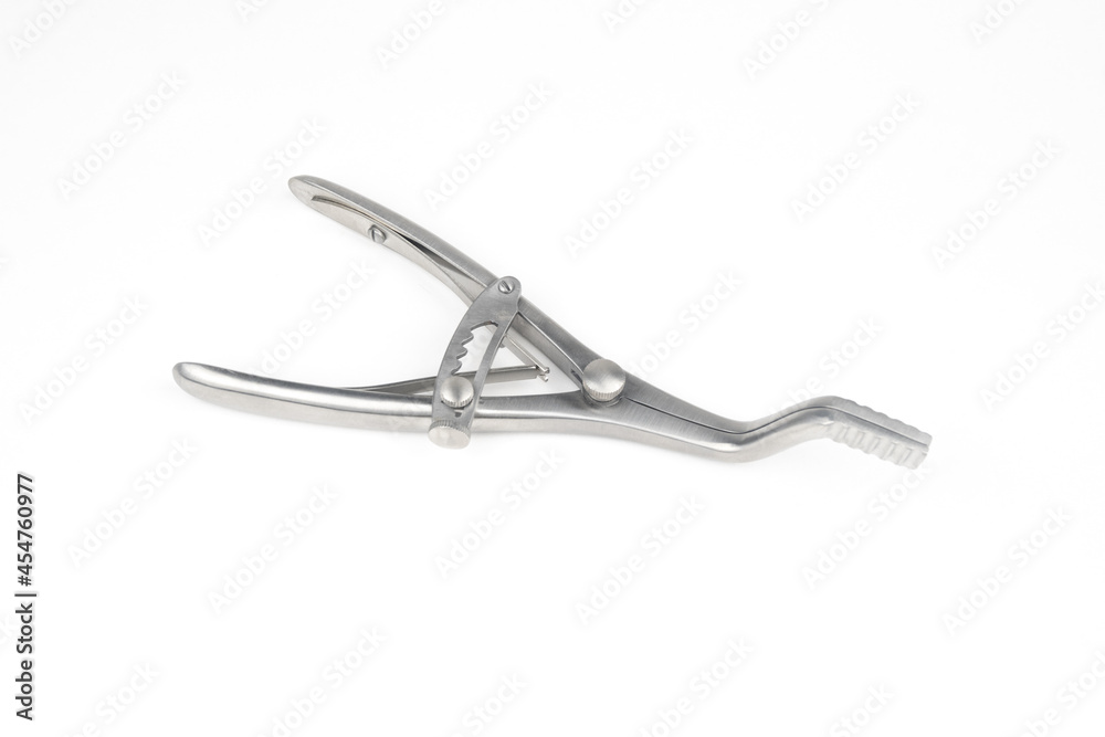 steel surgical clamp with retainer on a white background