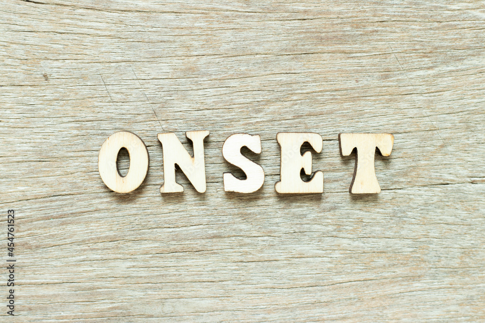 Alphabet letter in word onset on wood background Alphabet letter in word onset on wood background