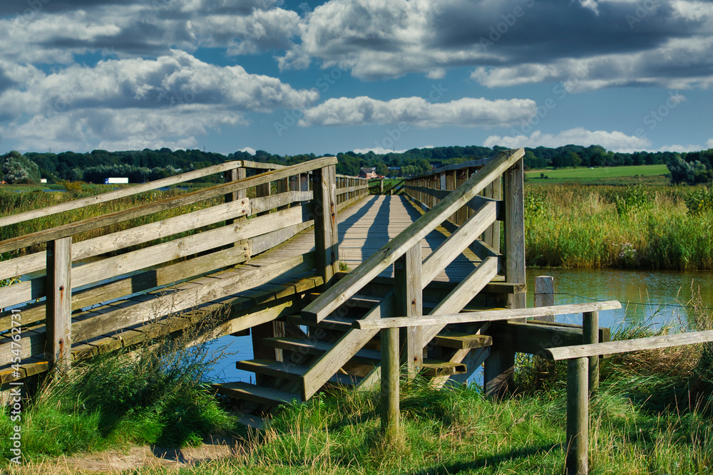 Fototapeta premium wooden bridge over the river