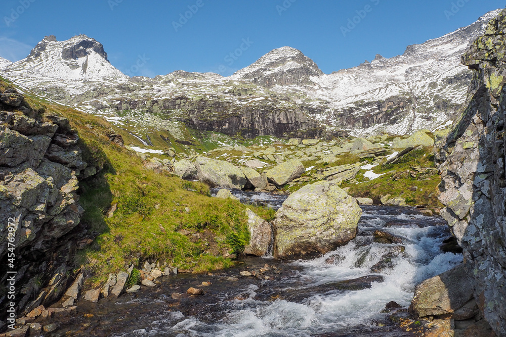 Messelingbach creek below lake Gruensee at Hohe Tauern mountain range