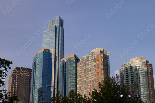 Modern Skyscrapers in Downtown Jersey City New Jersey and a Blue Sky © James