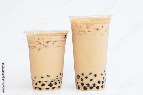 Double two cup iced milk tea and bubbel boba Taiwan Style on white background, Isolated popular Fresh drink in Thailand