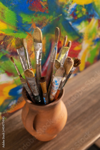 Paint brush and art painting canvas as abstract background texture. Paintbrush painting