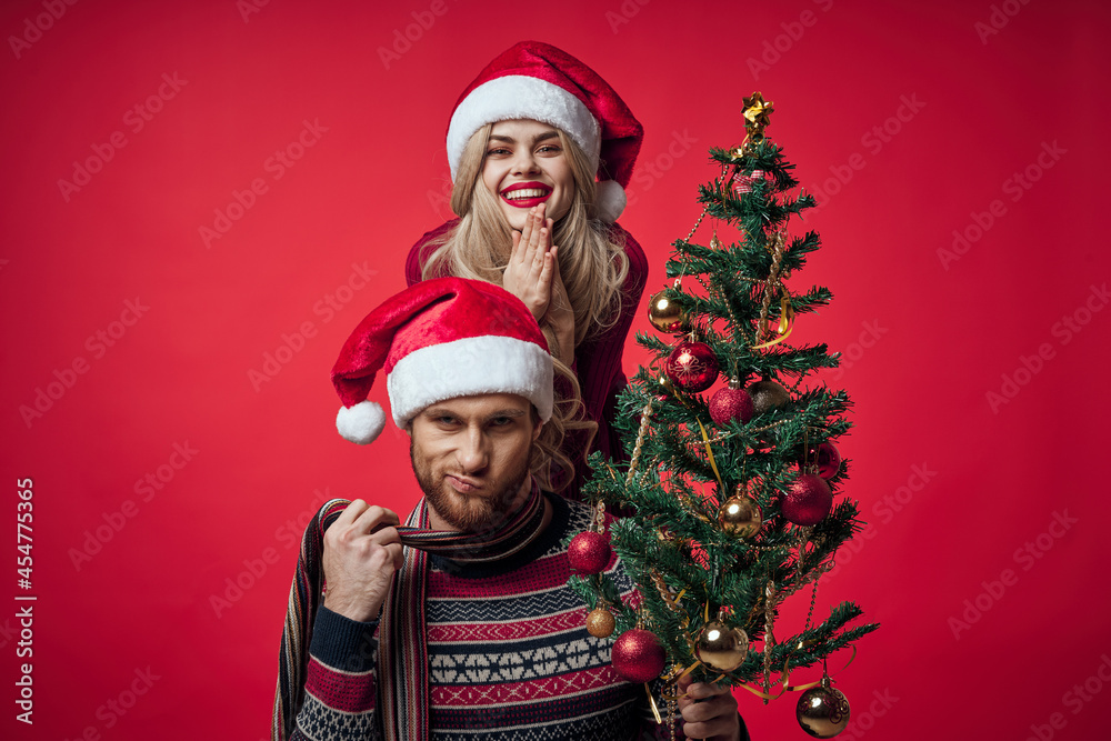man and woman new year tree decoration family holiday man and woman new year tree decoration family holiday