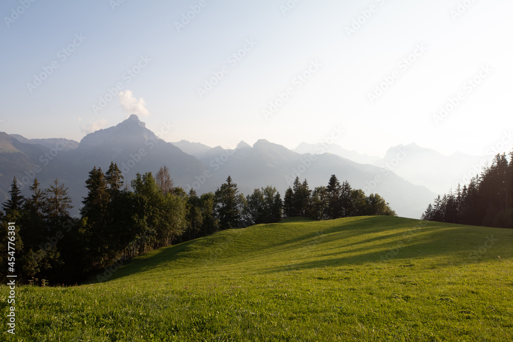 Obraz premium Amazing view over Lake Walen in the Canton Glarus, Switzerland. Wonderful sunset and sunrise in the swiss alps. This is a great place to hike and enjoy the beautiful nature in Switzerland.
