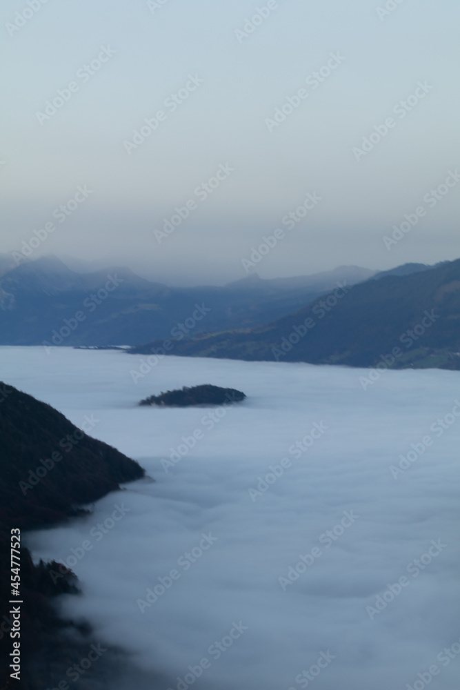Amazing morning view over the beautiful Lake Lucerne. Epic sunset in the heart of Switzerland. Wonderful scenery with the majestic fog and the swiss alps in the background. Amazing morning view over the beautiful Lake Lucerne. Epic sunset in the heart of Switzerland. Wonderful scenery with the majestic fog and the swiss alps in the background.