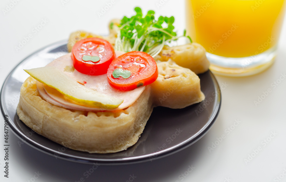Reindeer shaped crumpets served with ham, tomato, cucumber, and watercress
