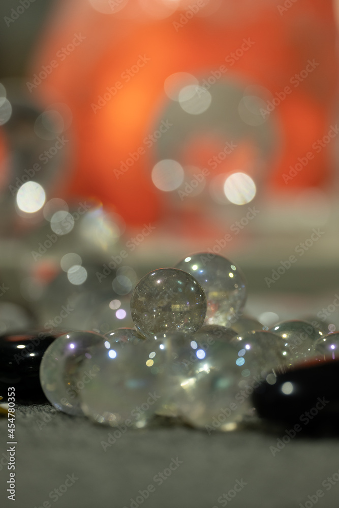 Marble and glass balls with blur colorful background Marble and glass balls with blur colorful background