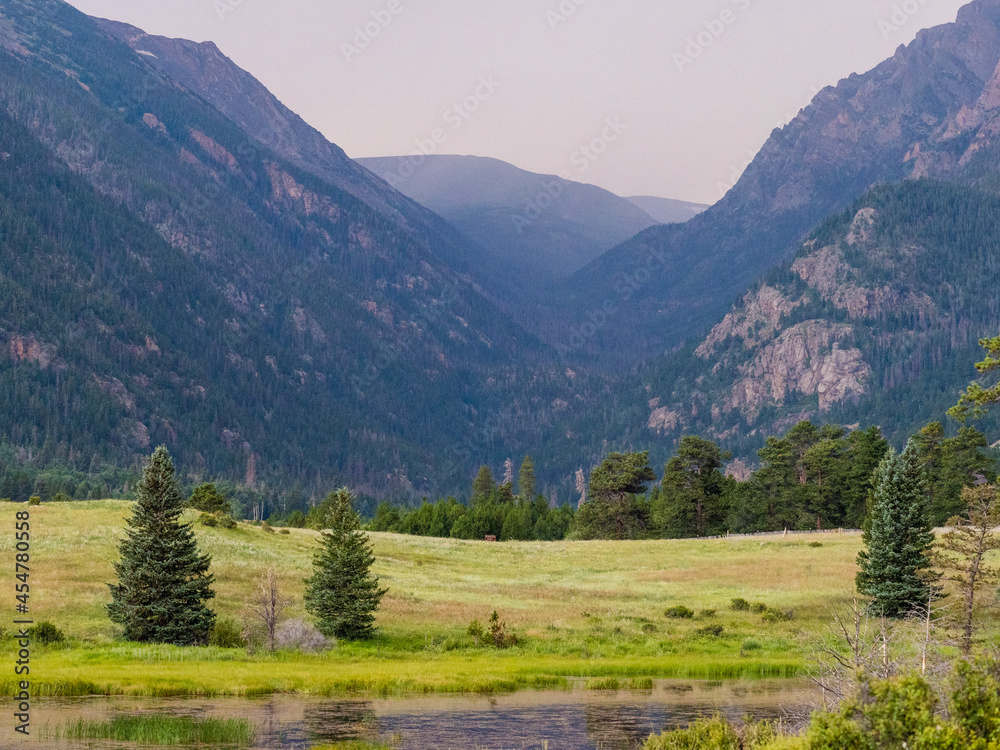 Fototapeta premium Nature landscape of meadows, forest and mountains.