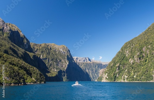 Landscape of fjord in New Zealand called Milford Sound in sunny day