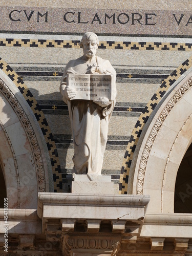 Statue at the fassade of Basilica Agoniae Domini near the garden of Gethsemane in Jerusalem, Israel photo