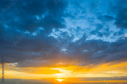 dramatic cloudy sky at the sunset, evening sky natural background © Yuriy Kulik