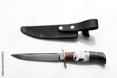 Handmade beautiful hunting knife with a sharp gray blade
