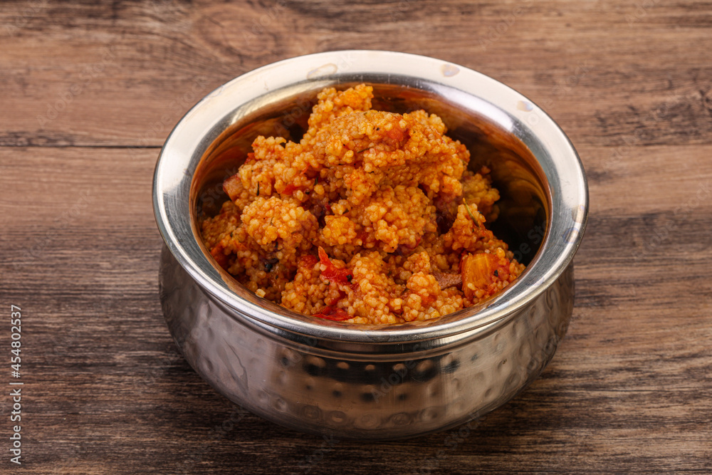 Couscos with tomato and chicken Couscos with tomato and chicken