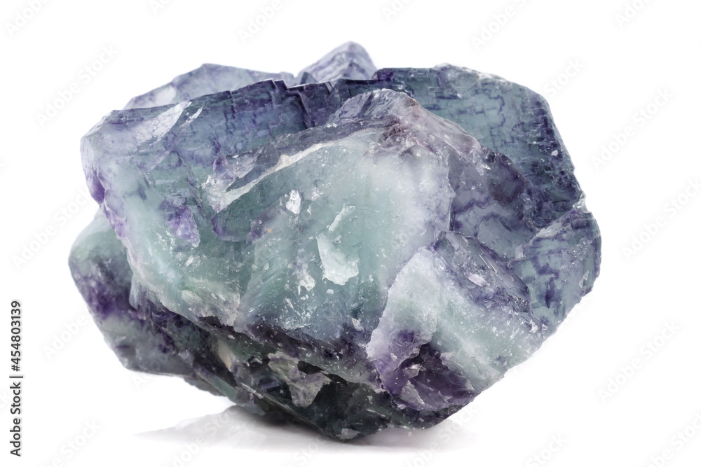 Fototapeta premium Macro mineral stone Fluorite on white background close up