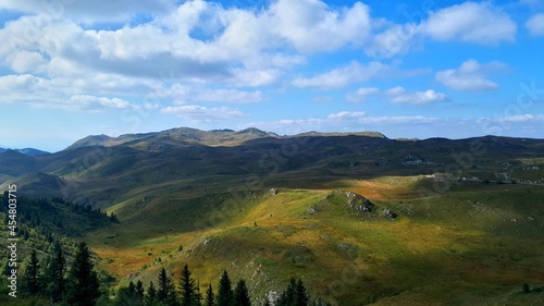 Mountain Jahorina plateau full of colours in september, landscape with clouds and sky, Bosnia and Herzegovina