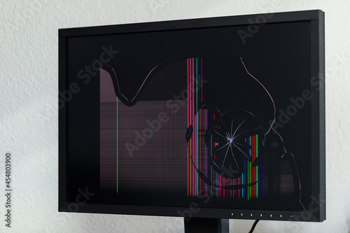 a graphic computer monitor with a cracked display