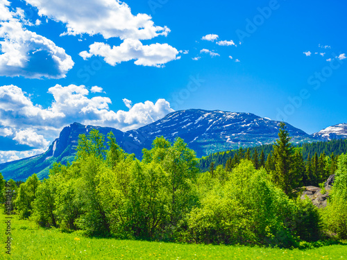 Beautiful Hydnefossen and Veslehødn mountain panorama Norway Hemsedal. photo