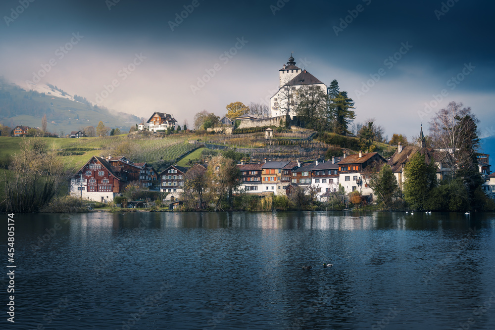 Obraz premium Skyline of Buchs with Werdenberg Castle and Werdenberg Lake - Buchs, Switzerland