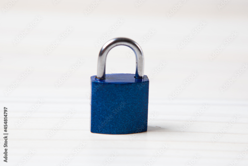 lock on a wooden table lock on a wooden table