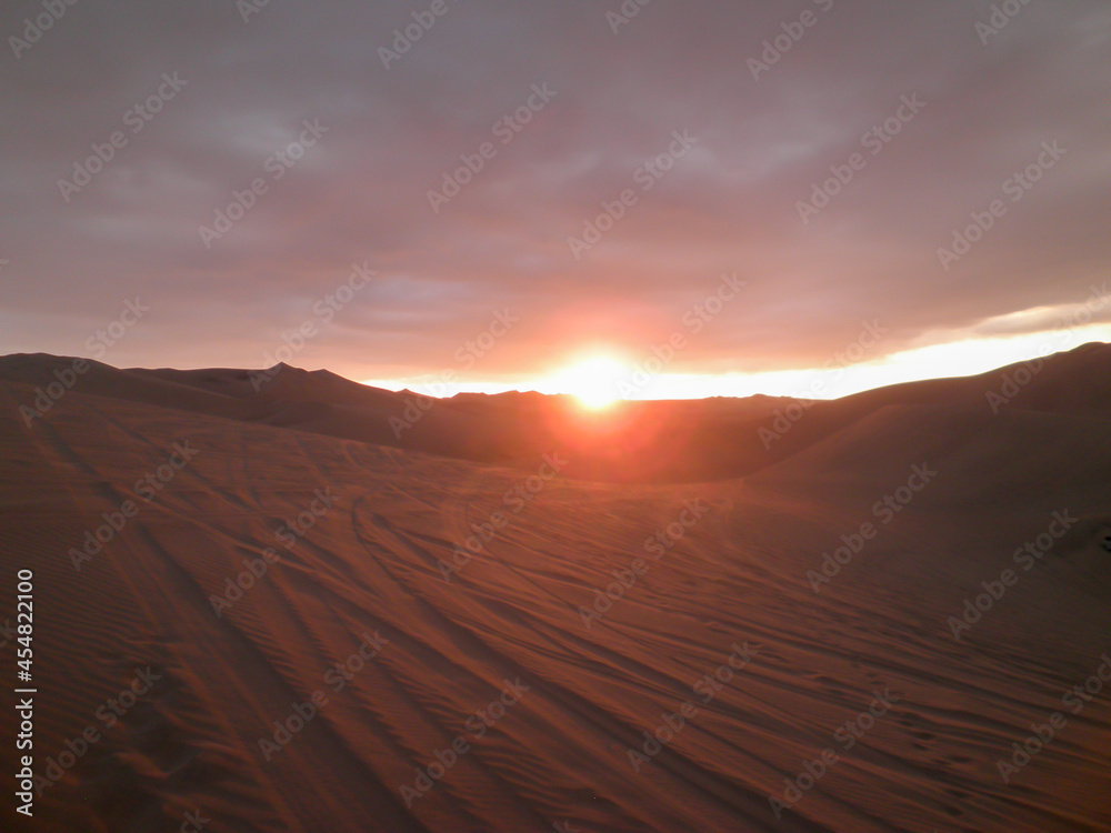 sunset in the ica desert - peru.