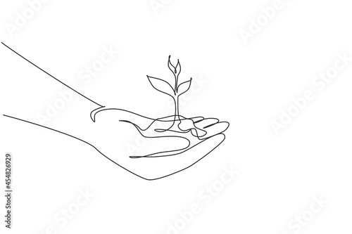 Continuous one line drawing close up image of human hands holding sprout. Hand holding tree on nature field grass forest conservation concept. Single line draw design vector graphic illustration