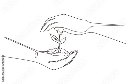 Single one line drawing new life in young hands on white background. Female hand holding tree on nature field grass Forest conservation concept. Continuous line draw design graphic vector illustration photo