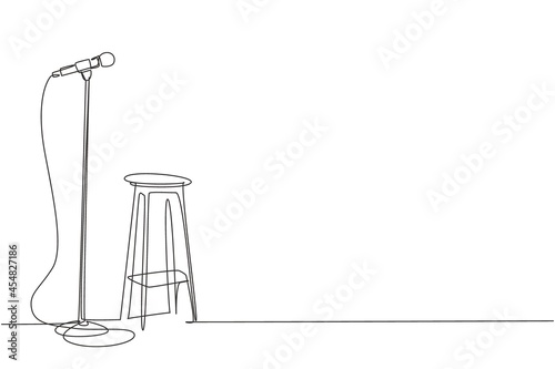 Fotografiet Single continuous line drawing microphone and stool on stand up comedy stage