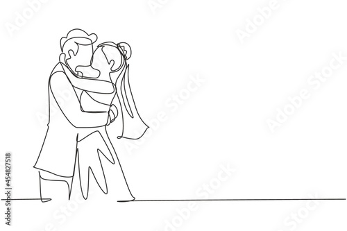 Continuous one line drawing woman and man stand in love and kiss each other in wedding celebration. Young married couple lovers kissing with wedding dress. Single line draw design vector graphic