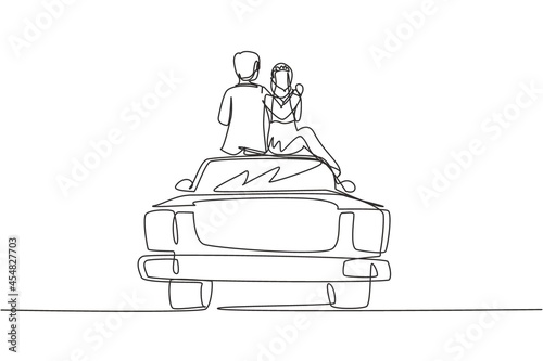 Single continuous line drawing happy married lovers sitting on roof of car and look at romantic scenery. Man and woman with wedding dress celebrating wedding party. One line draw graphic design vector