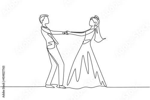 Single one line drawing happy cheerful boy and girl dancing on the floor at wedding party. Romantic young wedding couple holding hands and spinning around. Continuous line draw design graphic vector