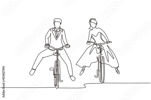 Single continuous line drawing married couple riding on bicycle. Romantic teenage couple ride bike with wedding dress. Man and woman in love. Happy married couple. One line draw graphic design vector