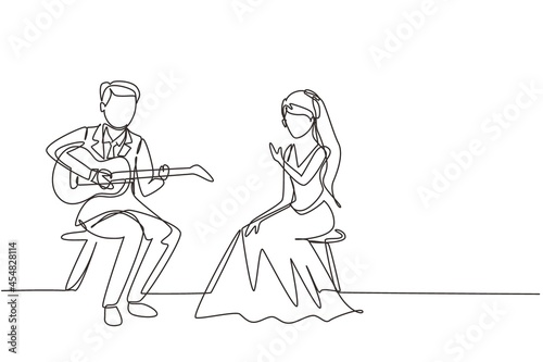 Continuous one line drawing married couple with wedding dress sitting on chair. Man playing music on guitar, girl listen and singing together at wedding party. Single line draw design vector graphic