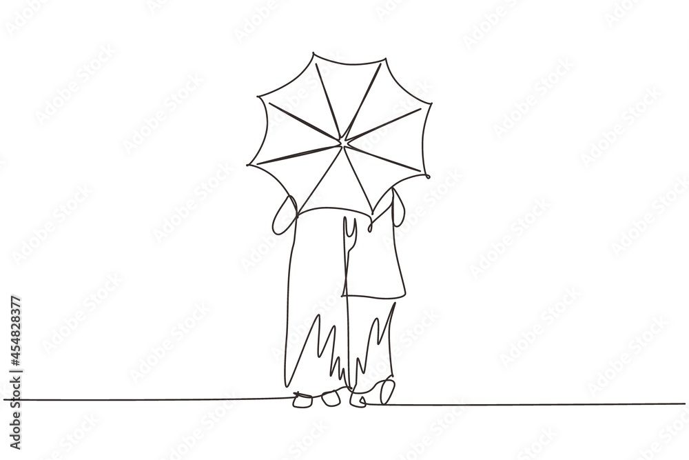 Single one line drawing back view young Arabian couple man woman, girl and boy walking holding umbrella under rain. Romantic couple at rainy autumn weather. Continuous line draw design graphic vector