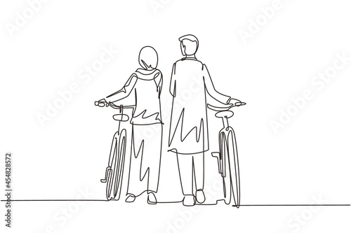 Single continuous line drawing rear view couple Arab man and woman walking together with bicycle. Young boy and girl in love. Happy romantic married couple. Dynamic one line draw graphic design vector