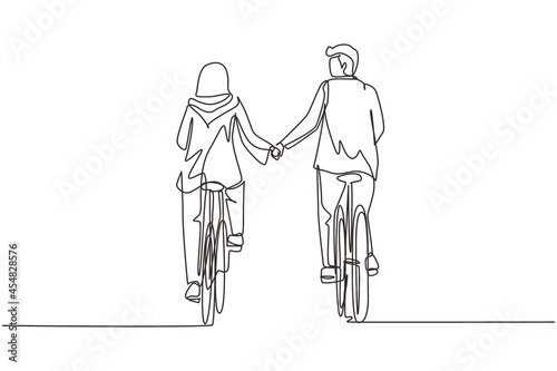 Continuous one line drawing happy Arabian couple ride bicycles in meadow back to camera and holding hands. Man and woman in love. Happy romantic married couple. Single line draw design vector graphic