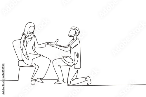 Continuous one line drawing Arab man makes marriage proposal woman and gives ring. Happy couple getting ready for wedding. Bride and groom celebrate engagement. Single line draw design vector graphic