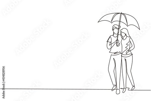 Single one line drawing young couple man woman, girl and boy walking holding umbrella under rain smiling hugging. Romantic couple at rainy autumn weather. Continuous line draw design graphic vector