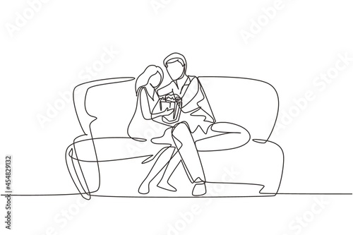 Continuous one line drawing couple at home resting on couch watching movie and eating popcorn. Domestic relax evening. Man and woman on cozy sofa. Single line draw design vector graphic illustration