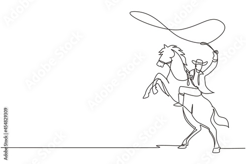 Single one line drawing cowboy with lasso on rearing horse. Cowboy with rope lasso on horse. American cowboy riding horse and throwing lasso. Continuous line draw design graphic vector illustration photo