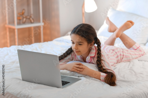 Cute girl watching cartoons...