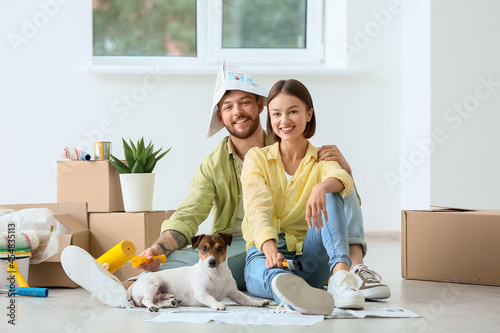 Young couple with cute dog ...