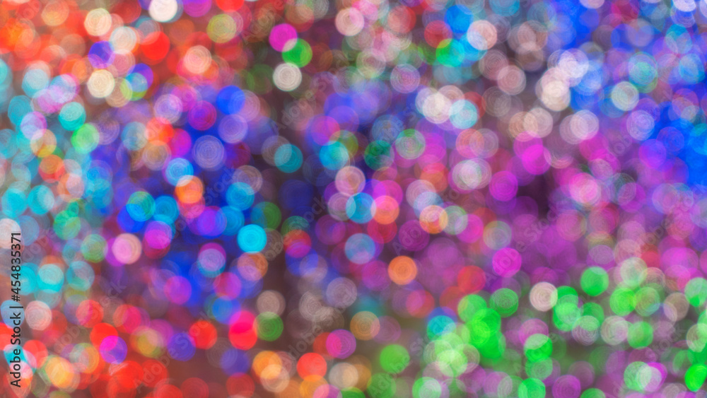 Colorful Christmas background. Bokeh effect. Blurry, defocused multicolored lights. The concept of Christmas and New Year. Christmas concept.