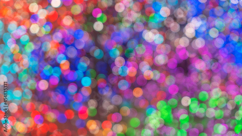Colorful Christmas background. Bokeh effect. Blurry, defocused multicolored lights. The concept of Christmas and New Year. Christmas concept.