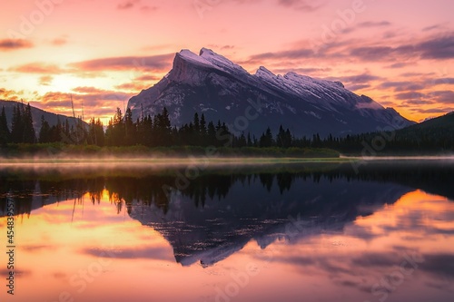 Orange Sunrise Sky Glowing Over Mountains At Vermilion Lakes